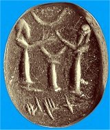 Sello de piedra negra, con forma el&iacute;ptica y unas dimensiones de 2,1 por 1,8 cent&iacute;metros